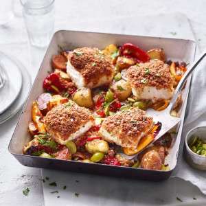 Chorizo-crumbed cod, pepper and olive traybake