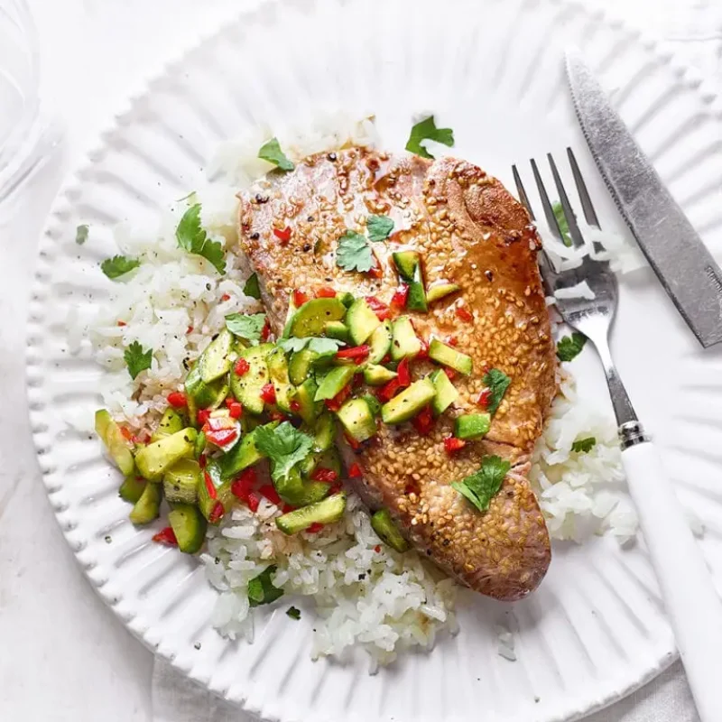 Sesame tuna Steak with Cucumber salad and Rice