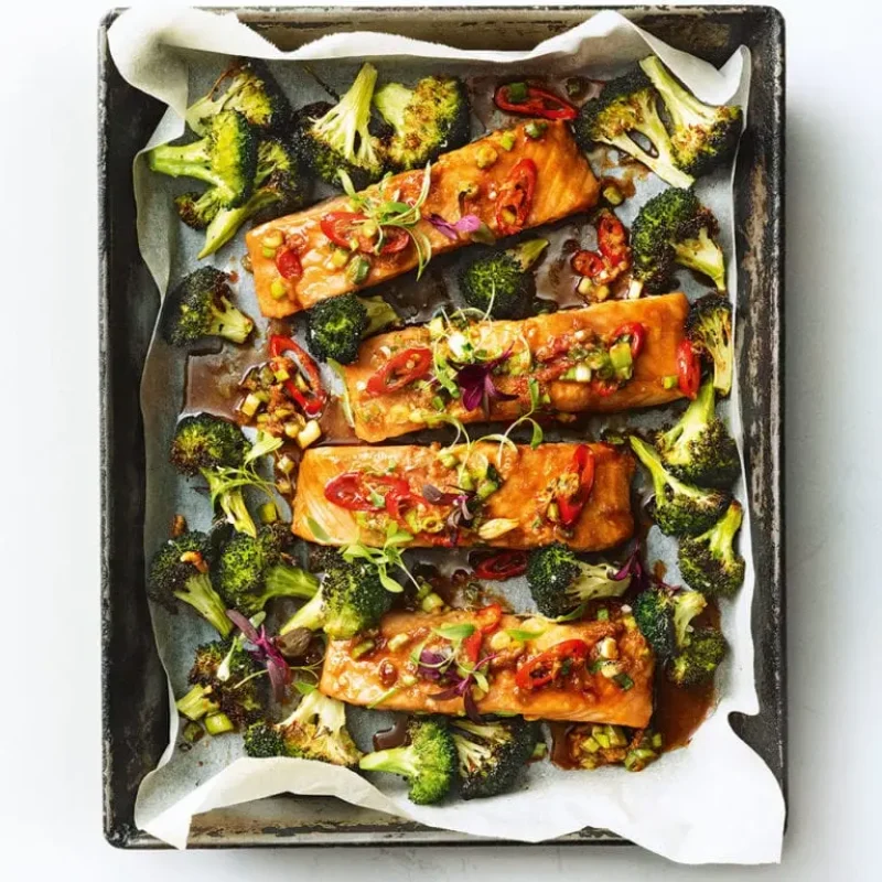 Salmon and broccoli traybake with spring onion and chilli